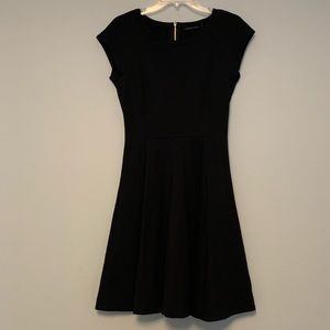 Monoprix black women’s dress with gold zipper